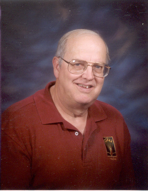 Jim Barrows (male) in a red polo